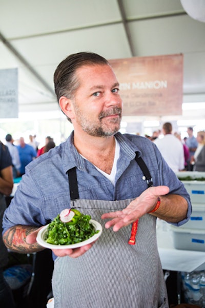 In the Grand Tasting tent, guests sampled snacks from chefs such as John Manion (pictured) of Chicago's La Sirena Clandestina. The tent also offered wine samples and desserts, and DJ Mel spun upbeat tunes nearby, creating a festive atmosphere.