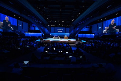 The conference included four keynote theaters, with the largest designed in-the-round for 13,500 people.
