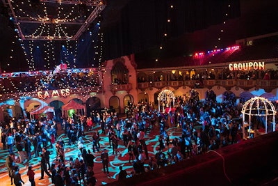 'Much of the decor was outlined in lights and had a vintage feel. Thousands of midway lights created a canopy over the dance floor and helped define the boardwalk ambiance,' says senior designer Jeffrey Foster at Event Creative, the Chicago-based event design and production agency that designed the event.