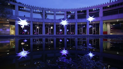 Serene pond becomes a theatrical environment with expert lightning. Photo by Steve Cohn.