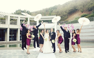 The scenic backdrop of the Taper Courtyard compliments jubilant wedding celebrants. Photo by Chocolate Photography.
