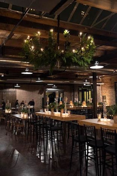 At Morgan Manufacturing's party in Chicago in December 2014, Event Creative designer Leslie Zaksas used fresh greens to decorate the venue's chandeliers for a festive feel and smell.