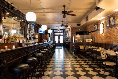 The 32-foot-long antique mahogany bar at The Bar Room.