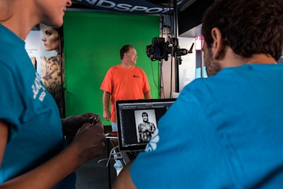 The Blindspot photo op allowed visitors to superimpose their faces on a fully tattooed body. The photos were also featured on a digital billboard.