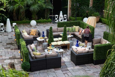 Create beautiful outdoor spaces using the Boca Collection and hedges to define spaces.