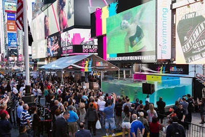 The live performances were also broadcast on Times Square billboards. A tent located next to the tank gave passersby the chance to test out the new EcoTank printers.