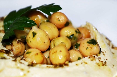 Mezetto's hummus with green tahini and harissa