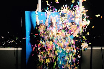 Confetti and props were available for guests to play with at a slow-mo video booth.