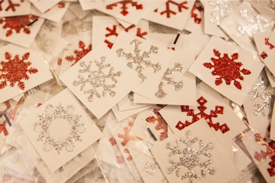 Winter-inspired temporary tattoos like glittery snowflakes were available for guests to decorate themselves at the Rock Paper Scissors Events-produced event.