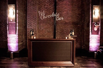 Guests could get toasty (and tipsy) at the hot chocolate bar with alcoholic mix-ins, which was set up at a private holiday party, held at 26 Bridge in December 2014 and produced by New York-based event firm Rock Paper Scissors Events.