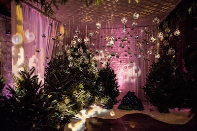 For a private holiday party, held at 26 Bridge in December 2014, New York-based event firm Rock Paper Scissors Events created a winter wonderland with a ski-lodge-type lounge, a snow machine, and a 'forest' of hanging ornaments filled with chocolate truffle favors.