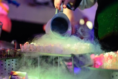 A chef prepared a cloud of nitrogen popcorn at the JDK Group-produced circus-inspired bash.