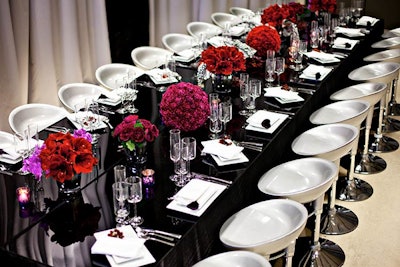 For Manhattan magazine's holiday dinner in fall 2011, the MWD Lifestyles team selected floral arrangements composed of bright blooms to pop against the white table setting. 'They are modern and can be accented with a cascading orchid or flower of the host's choice,' Wilson says.