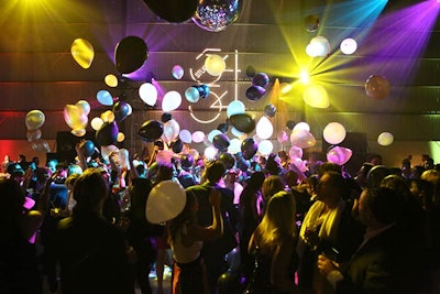 A midnight balloon drop kept the party going on the disco-ball-decorated dance floor at the ad agency affair. The theme was inspired by Deutsch LA's address: 5454 Beethoven Street.