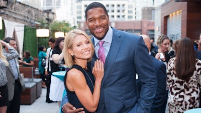 Michael Strahan and Kelly Ripa make a celebrity appearance at a Chicago rooftop event courtesy of ABC7's Windy City Live!