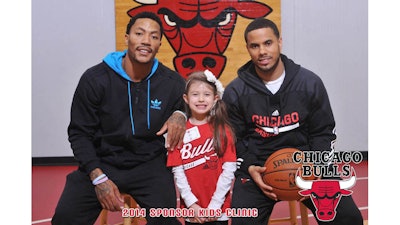 Chicago Bulls Sponsor Kids Clinic 2014, lucky kids of the sponsors got to pose with Derek Rose and received 5x7 prints instantly onsite.