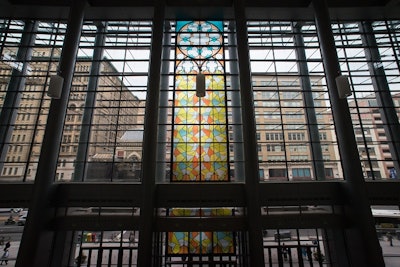 Hargrove transformed the modern Pennsylvania Convention Center to a cathedral-like building with the help of its massive stained glass window installation.