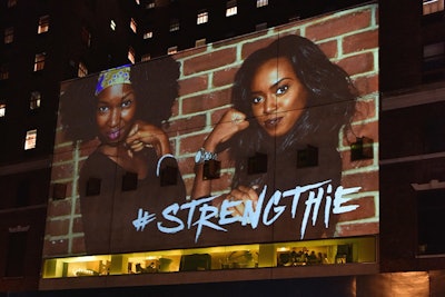 One Campaign worked with the Hudson Hotel team and digital content agency Dawn of Man to launch the #Strengthie art installation on the front of the hotel, which constantly changed with photos of people striking the Rosie the Riveter pose.