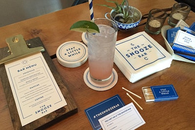 Swag branded in Casper’s signature blue-and-white color palette included cocktail napkins with a custom Snooze Bar logo, which artists used to sketch out guests’ dreams.