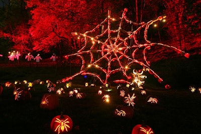 A team of artists carve more than 7,000 pumpkins, creating elaborate designs such as a giant spiderweb, as part of the Great Jack O’ Lantern Blaze, located at the Van Cortlandt Manor in Croton-on-Hudson, New York.
