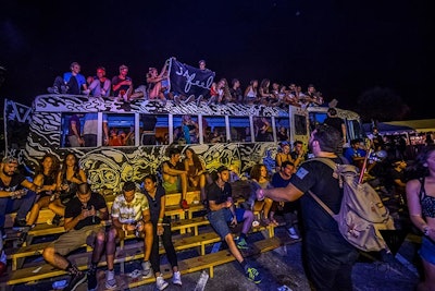 The WeWork Lounge by Muse Directive, a converted school bus, returned to the festival. The seating inside the bus, as well as bleachers outside of it and standing room on top, were popular viewing points for sets at the Sector 3 stage. The bus also had a charging station inside.