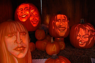 Professional pumpkin carver Hugh McMahon carved jack-o'-lantern-style pumpkins to resemble various celebrities, along with the president and first lady, at the Old Navy event.
