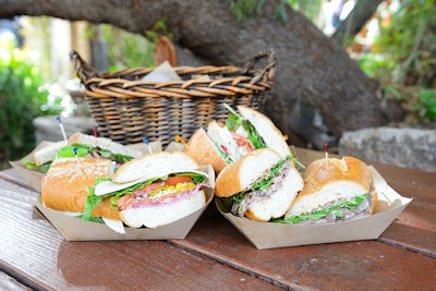 Classic roast beef sandwiches and Italian sandwiches with layered meats, shredded Parmesan Reggiano and Asiago cheeses, red onion, pepperoncini, and Farmhouse vinaigrette served on baguettes, by Santa Barbara Catering Company in Tempe, Arizona