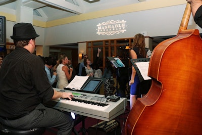 A jazz band entertained guests at Mashable's late-night lounge at the A.N.A. Masters of Marketing conference.