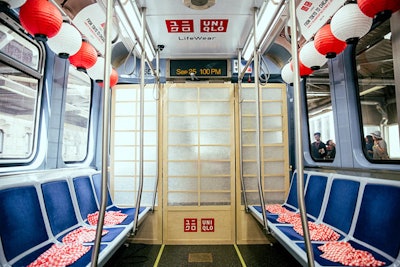 Tokyo-inspired decor includes red-and-white paper lanterns and folding screens.