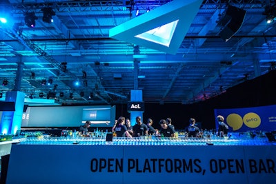 An open bar serving cocktails was decorated with text that reiterated the company's open platform stance.