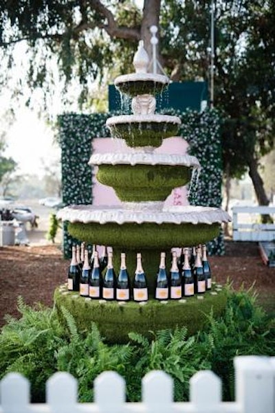 Bottles decorated a flowing fountain.