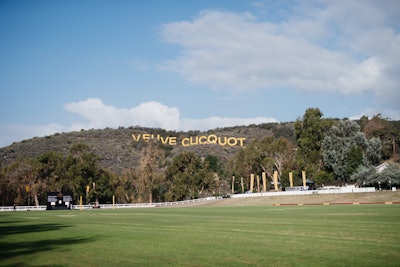 A sign on the hills above the sixth annual Veuve Clicquot Polo Classic in Los Angeles mimicked the iconic Hollywood sign.
