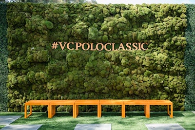 A hashtag decorated a wall of greenery and was designed to inspire guests to share photos on social media.
