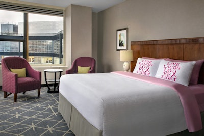 Guests staying at the Courtyard New York Manhattan/Midtown East have the option of booking a pink-theme suite, with the hotel donating $100 per stay to the breast cancer nonprofit Komen Greater NYC. The suites are adorned with pink pillows and linens, and guests receive a swag bag with Susan G. Komen Race for the Cure T-shirts, armbands, and a pin, along with a donation card for additional contributions. Guests also may select two promotional items from Susan G. Komen that are mailed to them after their stay.