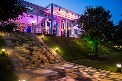 For the Washington National Opera benefit, organizers created a canopy to hang over the middle section of the patio, with tents flanking it. The canopy’s design featured a geometric look—in keeping with the building architecture—with perforations that allowed guests to see through to the night sky.