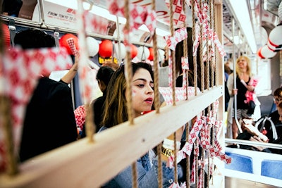 Inspired by the Japanese fortune-telling tradition called omikuji, organizers tied paper strips containing special notes and prizes onto strings. Prizes range from tickets to Chicago's Museum of Science and Industry to two tickets to Tokyo. The activation is called the 'Lucky Kuji' raffle.