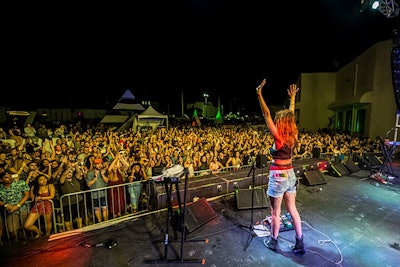 Some of the five stages, including the Mind Melt stage, were outside. Female indie rockers Warpaint performed there on Friday night.