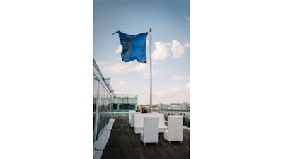 Indoor and outdoor table settings on top of the Nation's Capital.