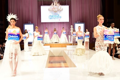 Models wear designer-made wedding gowns fashioned from Cashmere Bathroom Tissue at the annual White Cashmere Collection Fashion Show in Toronto. The 12th annual event, held September 29 at the Carlu, drew 250 guests including Toronto Mayor John Tory. The public is invited to vote on their favorite couture creations, with $1 per vote up to $10,000 donated to the Canadian Breast Cancer Foundation. Voting continues through November 3.