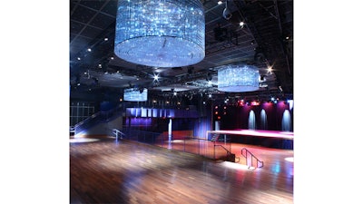 The main theater features a state-of-the-art in-house lighting system and a JBL sound system.