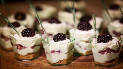 Mini Cheesecake Parfait with lemon cheesecake mousse, fresh blackberry and cookie crumble. Oh my!