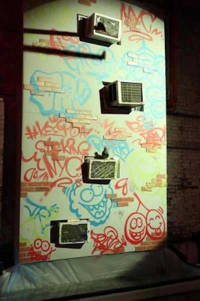 The numerous art installations included a replica of an apartment building exterior, complete with fake pigeons, leaky air-conditioning window units, and graffiti inspired by the Jolly Rancher campaign.