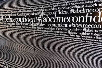Dressbarn's creative team designed a photo wall using the brand's established hashtag, #LabelMeConfident.