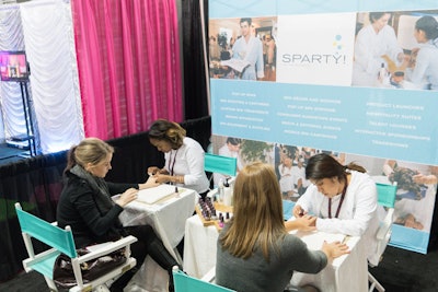 Sparty pampered guests on the trade show floor with free manicures.