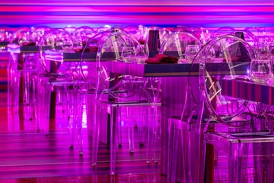 Event Creative's lighting gave Ghost chairs surrounding the tables a hot pink glow.