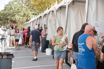 In the new Tasting Village, crowds could try free samples from a dozen food vendors.