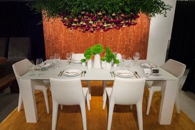 More flowers were found at—or rather, above—the table sponsored by Modern Luxury Interiors Chicago and decorated by Casa Spazio with Elizabeth Pasquinelli of Debaum Studio. The all-white installation was crowned by a canopy of upside-down carnations.