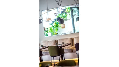 Comfortable couch seating for inside dining at KLIMA Restaurant and Bar
