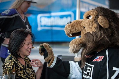 Guests could get their faces painted at one of the sports-fan-minded activities on site.