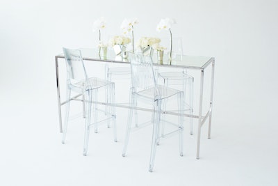 Taylor Creative's new runner table ($395) features an elegant chrome frame with a glass mirror insert, suitable for cocktails, communal dining, or product display. The table is available for rent throughout the mid-Atlantic region; pricing covers as much as a five-day rental period.